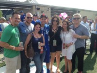 Bonnemaison Inc team with clients and celebrity Paul Rudd standing for a group shot at a baseball game
